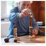 Abbildung zeigt Loggos Holz-Baustein-Set L aus Buchenholz und Nussbaum