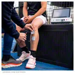 Abbildung zeigt Gymna Elexeo Ultraschalltherapie-Steuergert mit groem und kleinem Ultraschallkopf